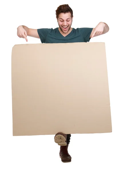 Man pointing fingers down to blank poster — Stock Photo, Image