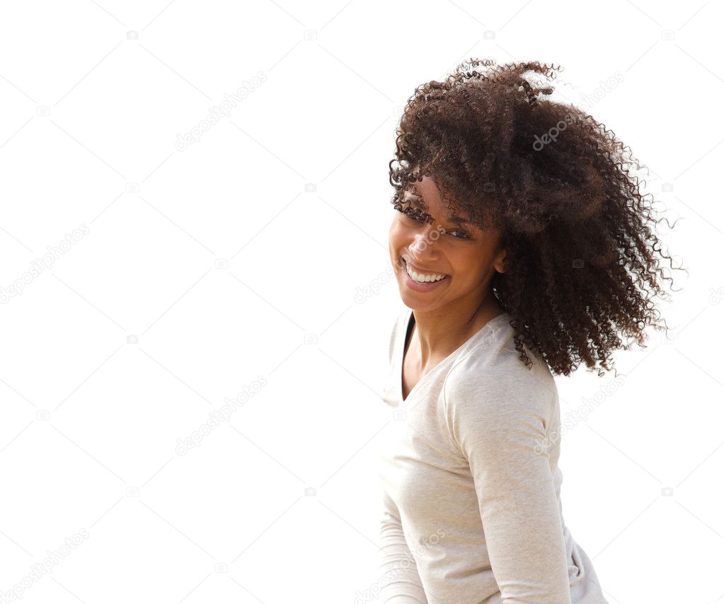 Beautiful young black woman smiling outdoors