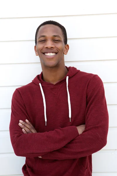 Jovem atraente sorrindo — Fotografia de Stock