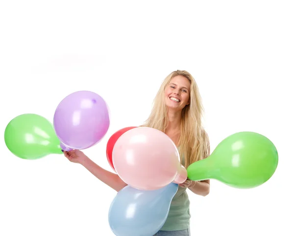 Souriant Jeune femme tenant des ballons — Photo