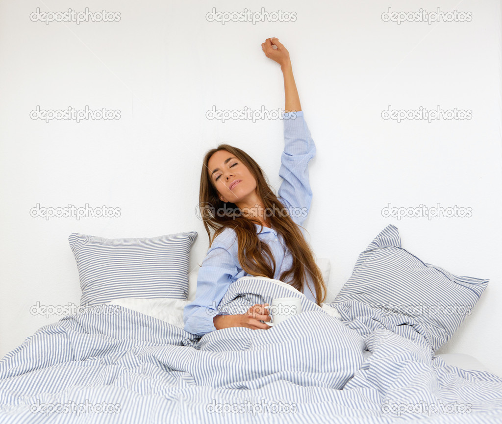 Young woman waking up