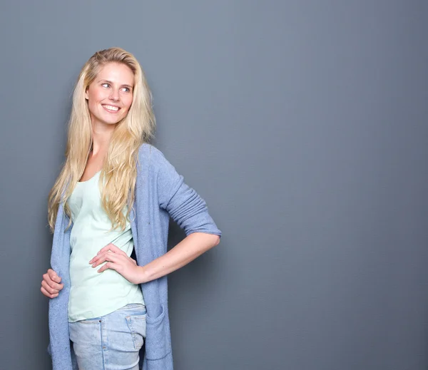 Portrait of a young blond woman smiling — Stock Photo, Image