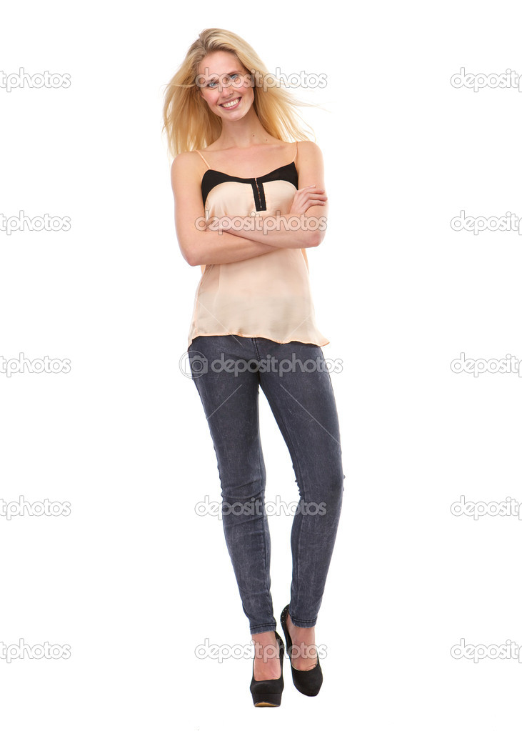 Young woman smiling with arms crossed