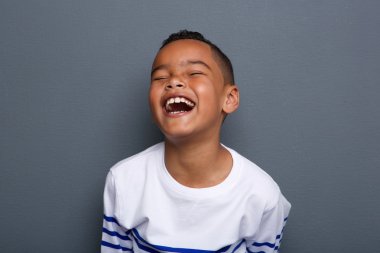 Excited little boy laughing clipart
