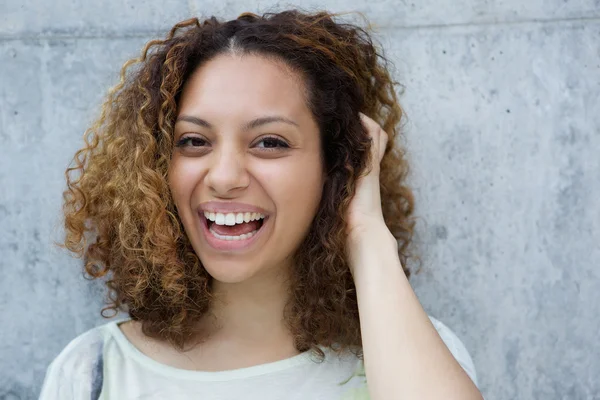 Cheerful young woman laughing — Stock Photo, Image