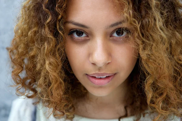 Beautiful young woman with serious expression — Stock Photo, Image