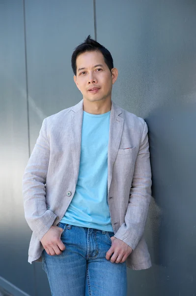 Mature man standing outdoors — Stock Photo, Image