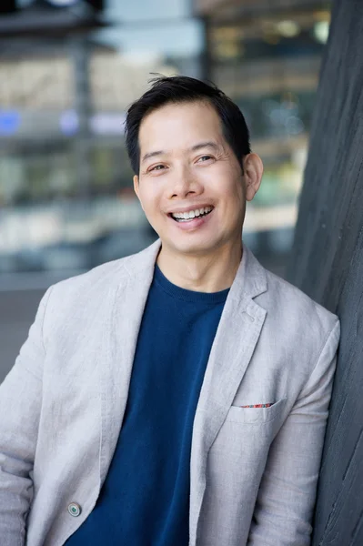 Cool middle aged asian man smiling — Stock Photo, Image