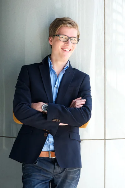 Fashionable young man with glasses smiling — Stock Photo, Image