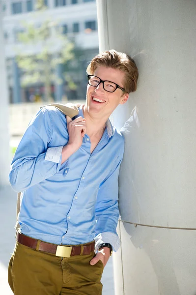 Portrait of a fashionable young man smiling — Stock Photo, Image