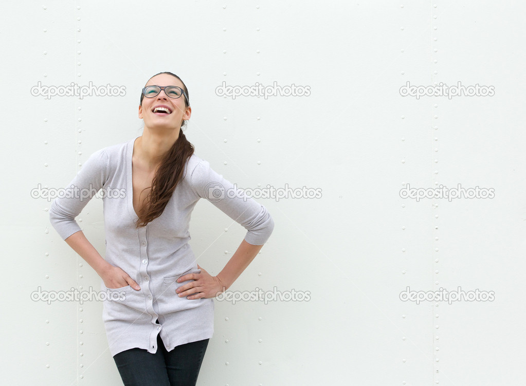 Young woman laughing and looking up