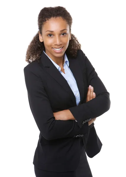 Young business woman smiling with arms crossed — Stock Photo, Image