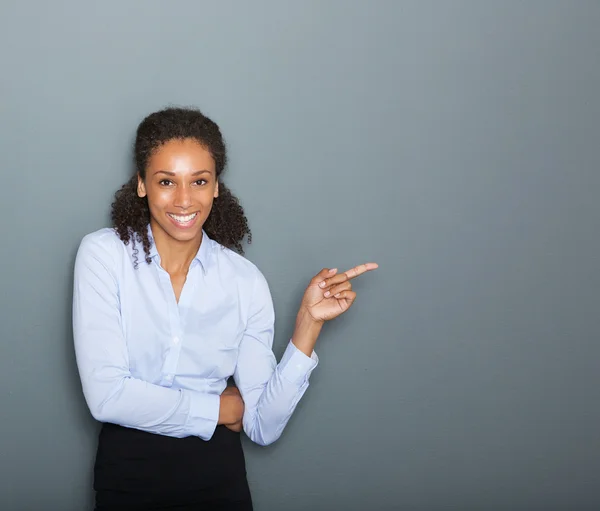 Mujer de negocios segura señalando con el dedo —  Fotos de Stock