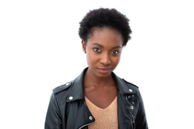 Close up horizontal portrait young african American woman with leather jacket against isolated white background staring