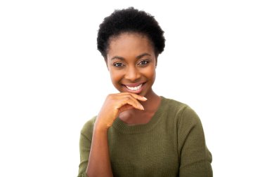 Close up portrait smiling young black woman with hand to chin thinking