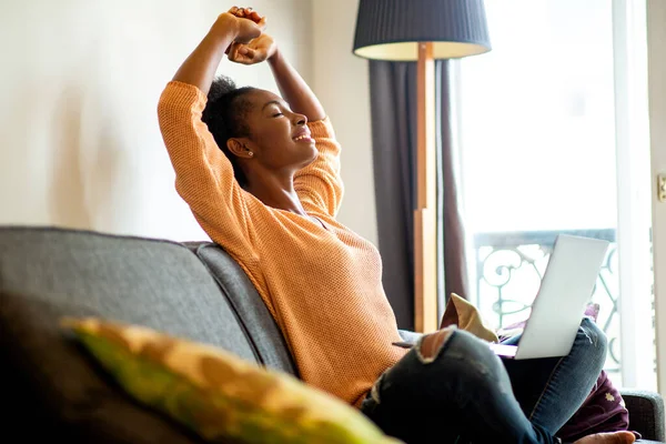 Portrait Beautiful Young Black Woman Sitting Sofa Laptop Arms Raised — Photo