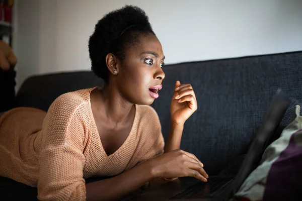 Portrait Shocked Black Woman Watching Video Laptop — Stockfoto