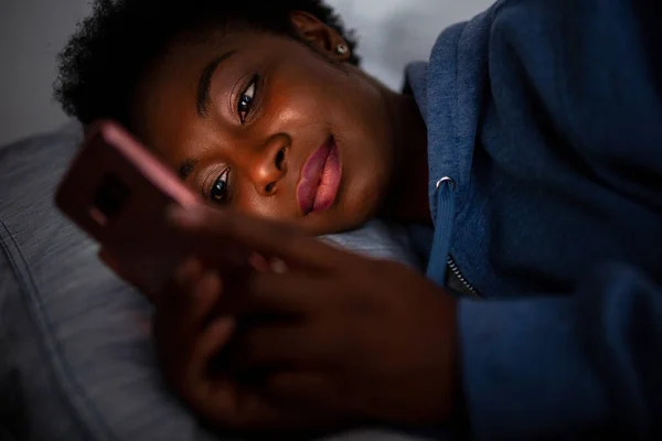 Close Portrait African American Woman Looking Phone While Bed — Stockfoto