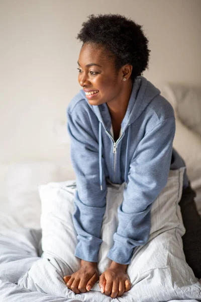 Portrait Relaxed African American Woman Sitting Bed Smiling — Stok fotoğraf