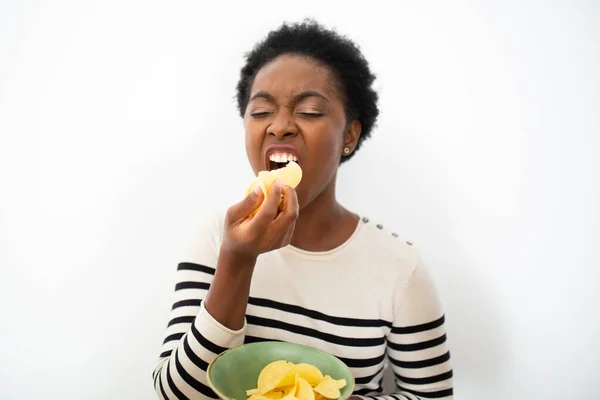 Portrait Hungry African American Woman Eating Chips Isolated White Background —  Fotos de Stock