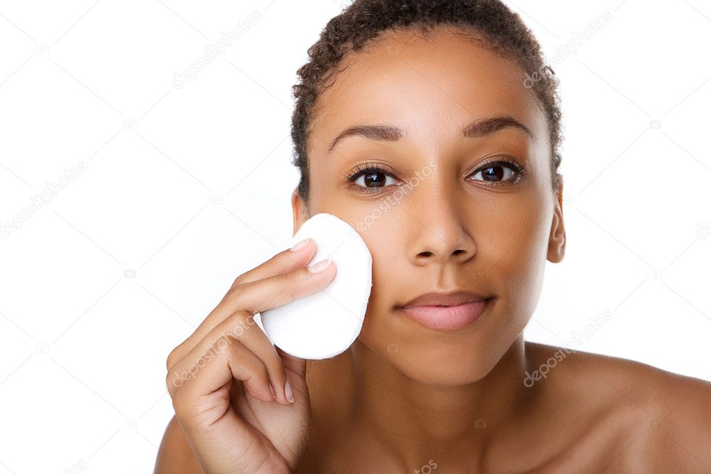 Beautiful black woman removing make up