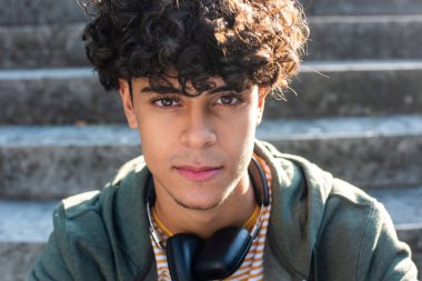 Close up front portrait handsome young guy staring