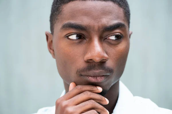 Close Portrait Serious Young African American Man Thinking Hand Chin — Stockfoto