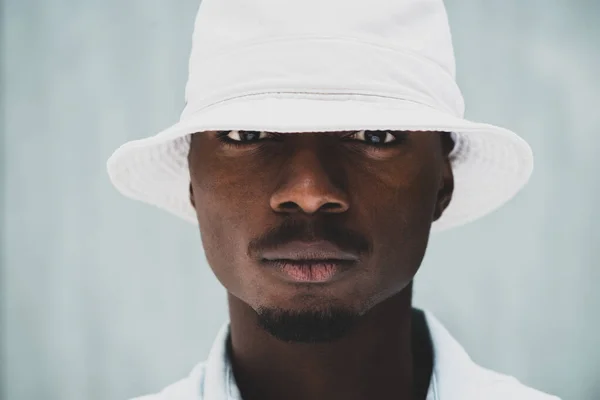 Close Portrait Serious Young African Man Staring Hat Head — Foto de Stock