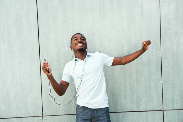 Portrait Happy Young African American Man Listening Music Earbuds Mobile — Stockfoto