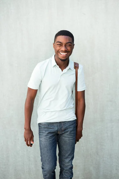 Portrait Smiling Young African American Man Walking Shoulder Bag — стокове фото