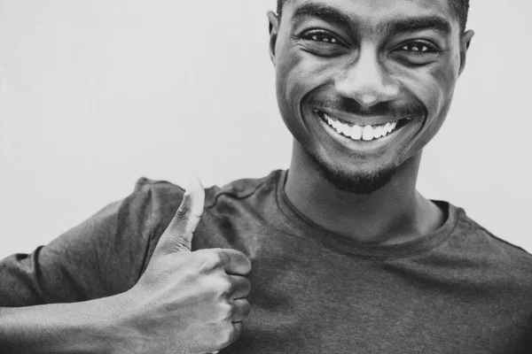 Close Black White Portrait Smiling Young Black Man Thumbs Hand — Fotografia de Stock