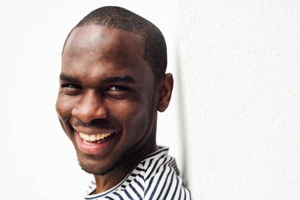Close Portrait Laughing Black Guy Leaning White Background — Stock Photo, Image