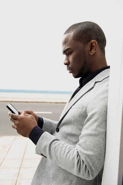 Profile Portrait African American Businessman Leaning Wall Looking Cellphone — Stock Photo, Image