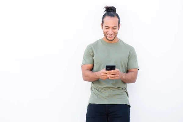 Happy Man Pulled Hair Bun Text Messaging Using Mobile Phone — ストック写真