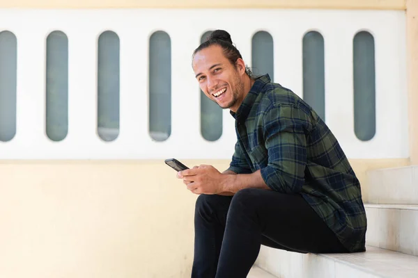 Portrait Happy Man Using Mobile Phone While Sitting Outdoors Staircase — ストック写真