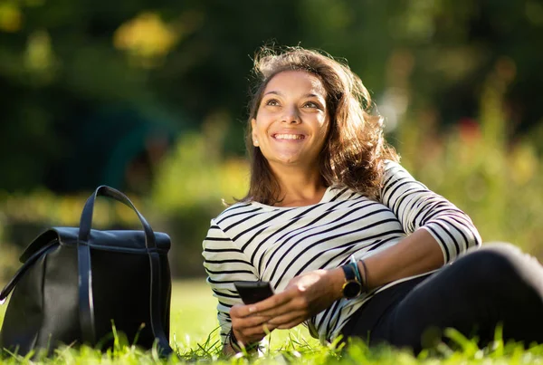 Portrait Happy Young Woman Sitting Grass Park Cellphone — Stock Photo, Image