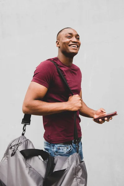 Side Portrait Happy African American Man Standing Bag Mobile Phone — Stock Photo, Image