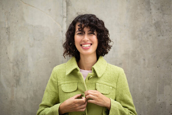 Portrait Happy Stylish Woman Buttoning Her Jacket Outdoors Stock Image
