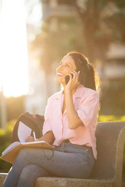 Portrait Happy Woman Sitting Outdoors Book Phone — Stock Photo, Image