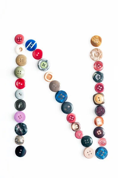 Letter alphabet formed of buttons — Stock Photo, Image