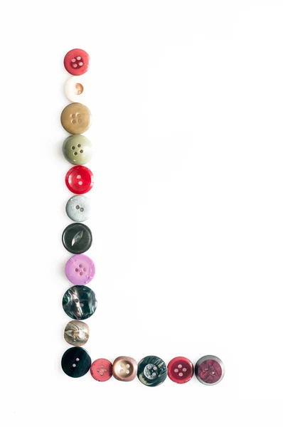 Letter alphabet formed of buttons — Stock Photo, Image