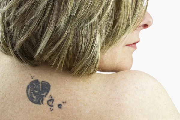 Tattoo of a woman — Stock Photo, Image