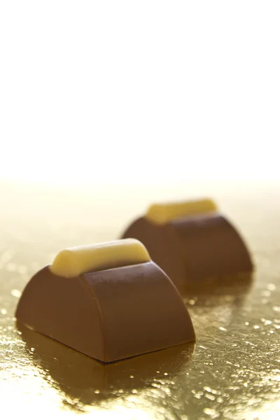 Chocolates on a white background — Stock Photo, Image