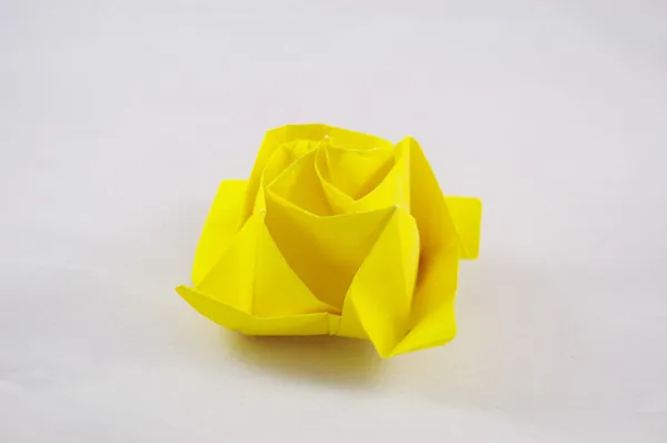 Gelbe Origami-Papier Rose lizenzfreie Stockbilder