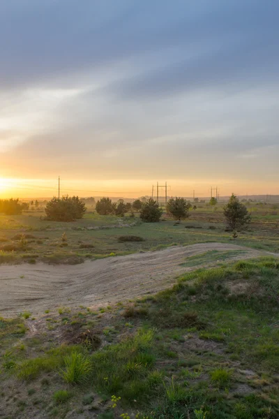 Estrada e pôr do sol — Fotografia de Stock