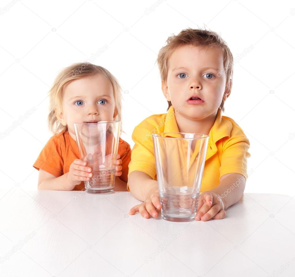 Little children hold glass