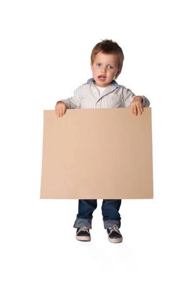 Niño sosteniendo una tabla —  Fotos de Stock