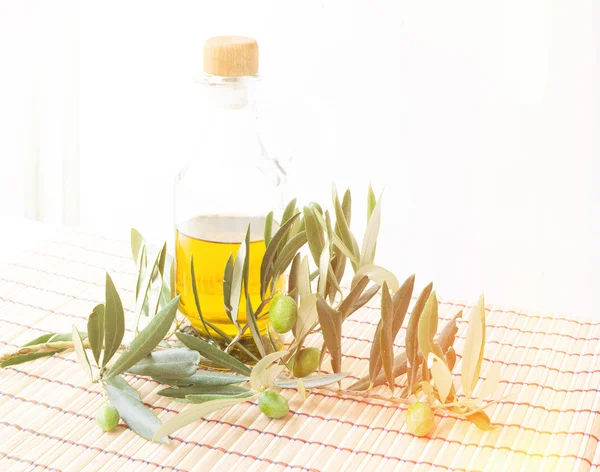 Glass bottle of olive oil. — Stock Photo, Image