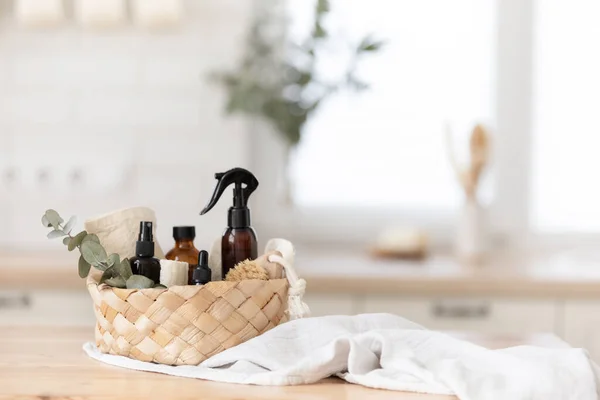 Essential oils in glass dark bottle. Skin and body care treatment concept. Eucalyptus branch. — Stock Photo, Image