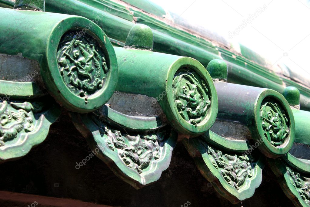 Old Chinese traditional eave with beautiful glazed tile